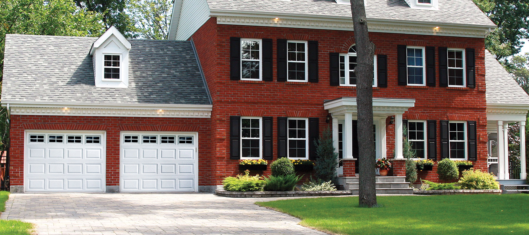 Traditional raised panel garage door installed by American Garage Doors