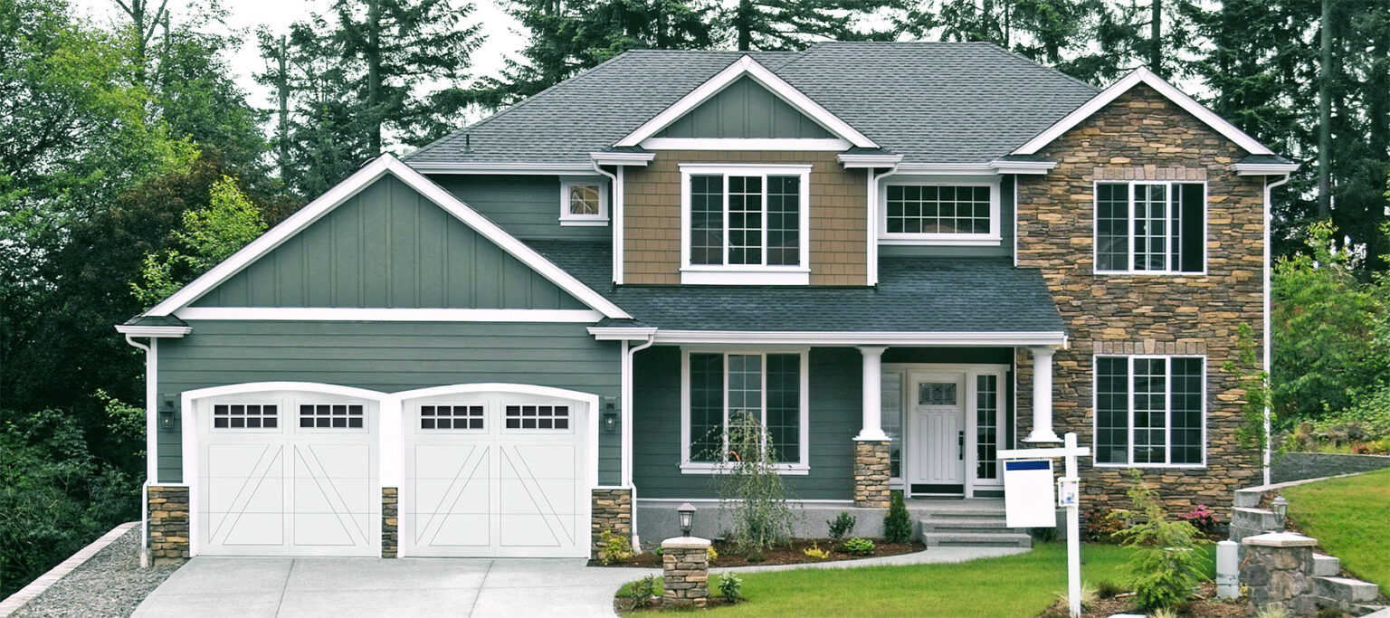 Carriage-house style garage door installed on a residential home